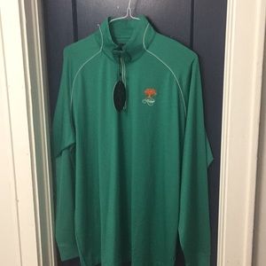 Greg Norman pullover.